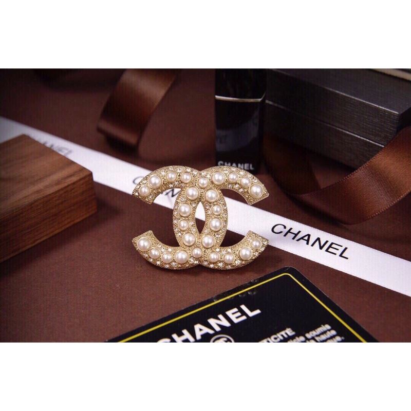 Ch*el brooches